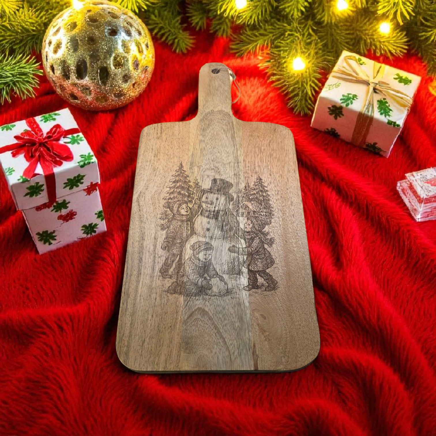 Winterliche Servierplatte aus Mangoholz