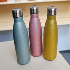 HUNTERLASE Thermoflasche in Glitzer-Pink, Blau und Gold mit persönlicher Gravur. Isolierende Trinkflasche für heiße und kalte Getränke.
